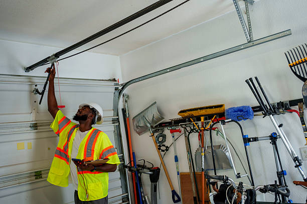Professional Garage Door Panel Replacement technician working in Thomas, OK
